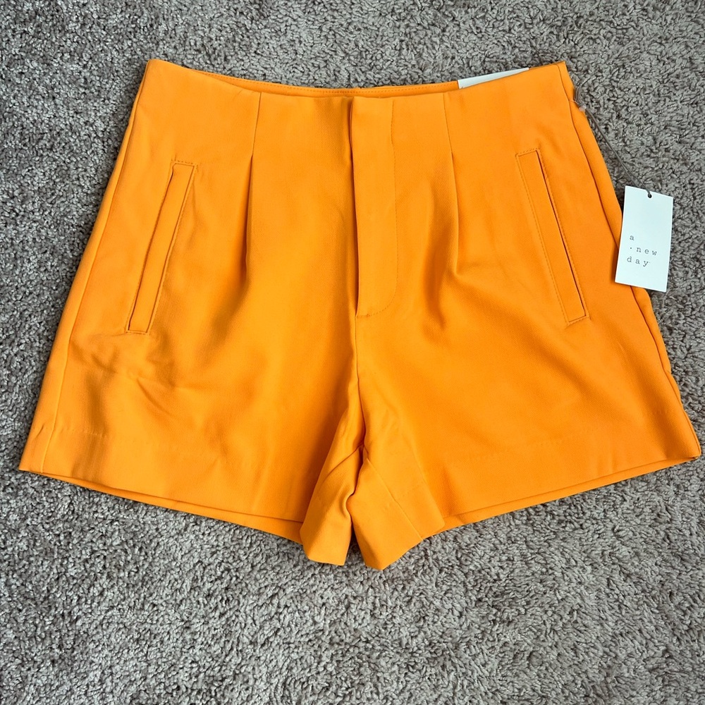 A new day Orange Midi shorts NWT